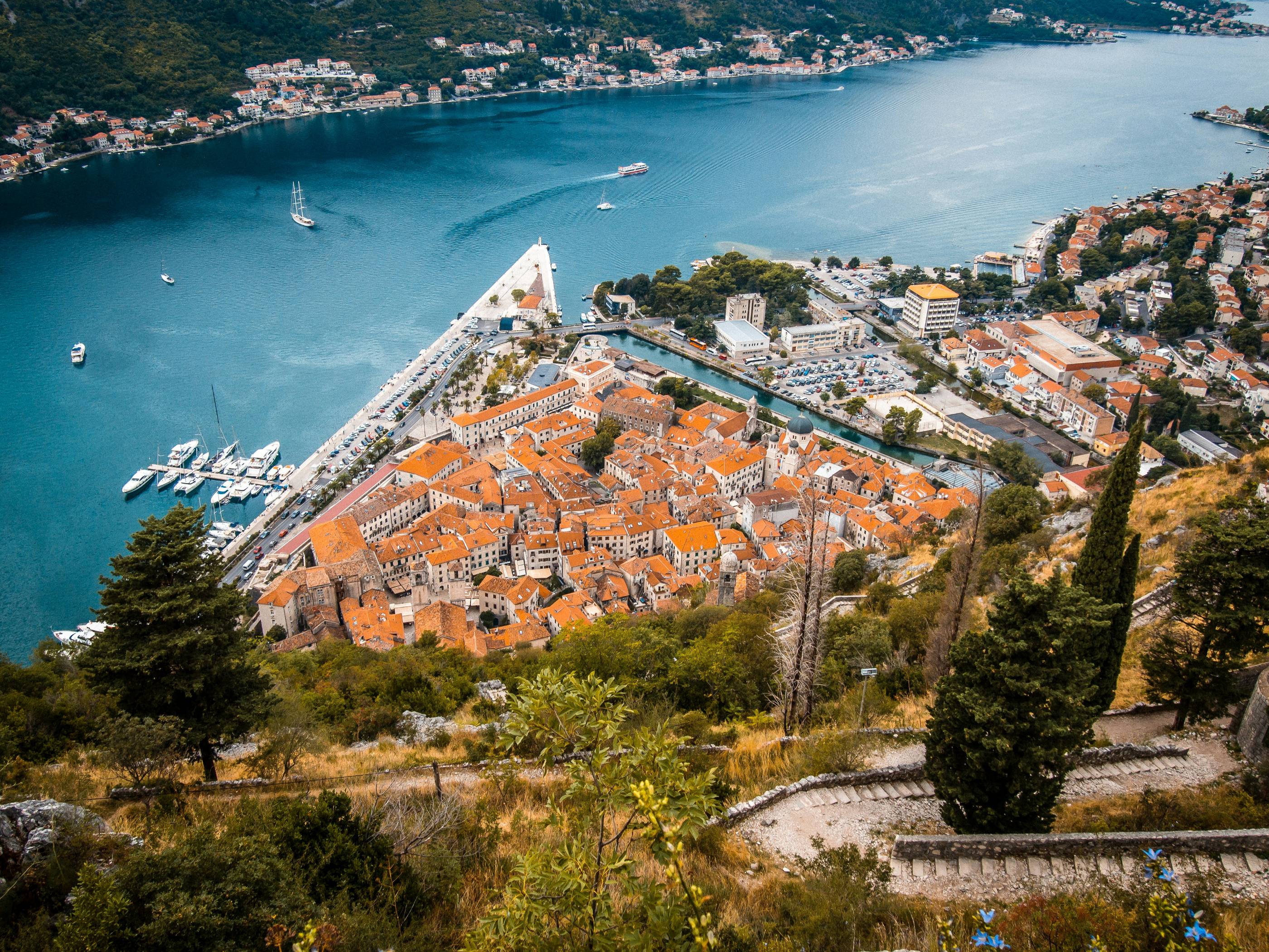 an aerial view of a city and a harbor